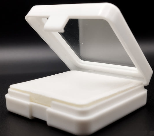 White plastic box with window and white pad (5,4 * 5,4 * 1,6 cm)